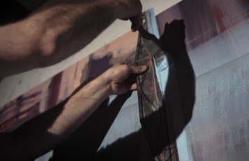 Andrew Fish, painting Tower. Film still: C49 Productions